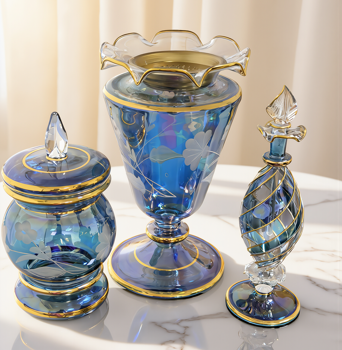 Blue etched bakhoor set: iridescent blue glass mabkhara, lidded bakhoor jar and perfume bottle